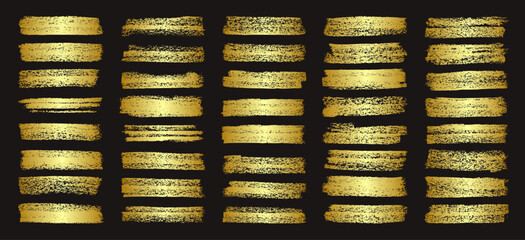 Golden brush strokes, lines, ink smudges, hand-drawn scribble shapes. Handmade sketchy marks, acrylic stains, charcoal streaks. Paint textures, dry brush effect. Marker underline. Vector illustration