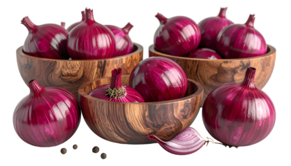 Several red onions in wooden bowls, with some loose, and a slice, on a black backdrop