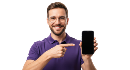 young caucasian man in a purple polo and modern glasses enthusiastically points at a blank black smartphone screen against a high-key white studio background with copy space. Concept for technology