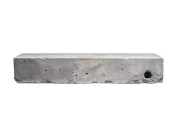 A weathered concrete block sits, showcasing its rugged texture and industrial aesthetic.