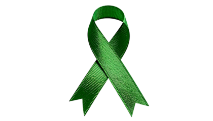 Single, glossy, green ribbon in a loop against a stark black background