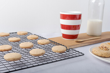 Homemade cookies and a bottle of milk.