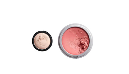 Open compacts with pressed powder, a light shade & a pink/coral blush on a black background