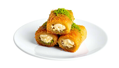 Stacked, golden-brown pastry rolls filled with white cream and topped with green crumble