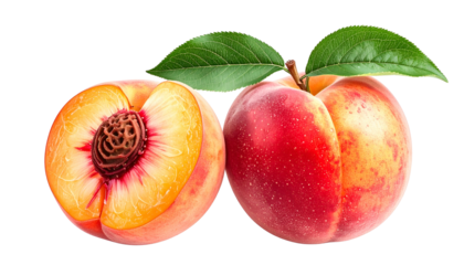 Two ripe peaches, one halved, reveal a stone; green leaves accent a vibrant fruit
