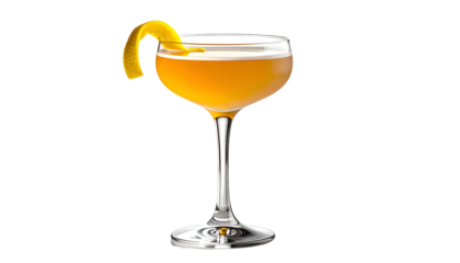 A stemmed cocktail glass with an amber drink, garnished with a citrus peel