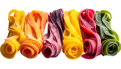 Colorful, uncooked fettuccine pasta spirals in various hues, arranged on a black background