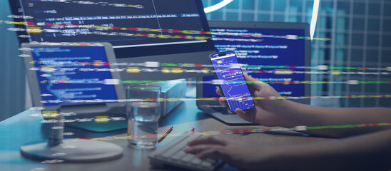 Male programmer working at table in office