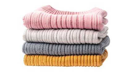 Stack of folded sweaters in pastel shades against a transparent background
