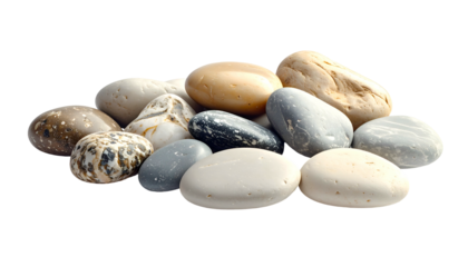 Close-up of smooth, assorted river rocks of varying sizes and hues on a black background
