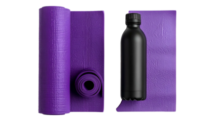 Rolled and unrolled purple yoga mat with a dark water bottle on a black background