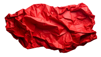 A vibrant, crumpled red sheet of paper against a stark black background