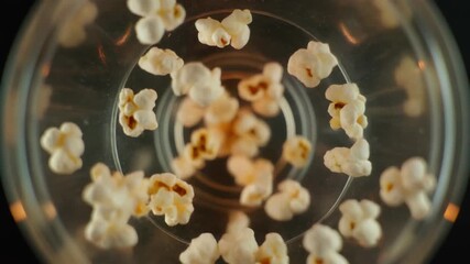 Closeup Macro Shot of Popcorn Popping in Slow Motion. 4k Food Footage Video - Powered by Adobe