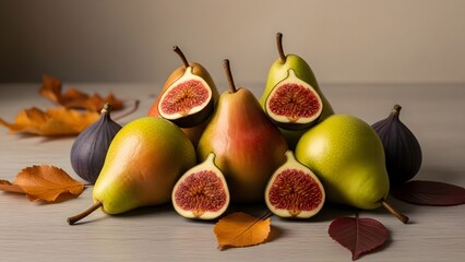 Fresh pears and figs with autumn leaves on wooden table