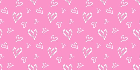 ​Hand-drawn white heart doodle seamless pattern on pink background. Romantic minimalist love wallpaper for Valentine&rsquo;s Day, wedding cards, textile prints, and digital scrapbooking wrapping paper.