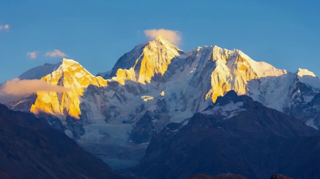 Majestic mountain range at sunset, showing the peaks and valley. A stunning aerial view of a travel destination.