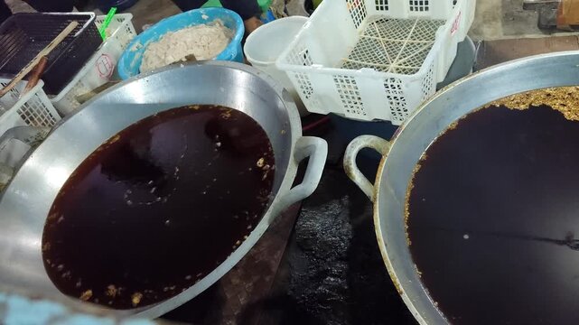 Pempek is fried and served with a sweet and sour sauce called kuah muka (vinegar sauce). Pempek is an Indonesian (Palembang) dish.