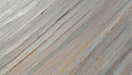 Abstract, textured close-up of grey and gold painted, diagonal brushstrokes