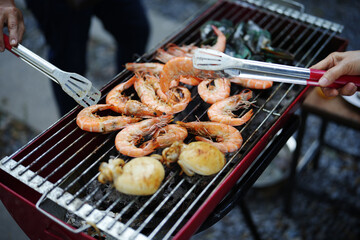 Grilled shrimp and grilled squid on the stove, Street food, Thailand