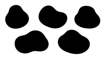 Abstract black irregular blob shapes on a white background minimalistic design