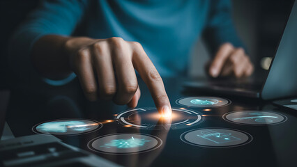 Person interacting with futuristic interface on laptop