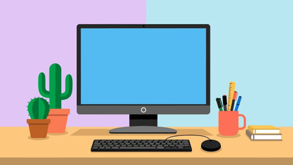 Modern computer setup with keyboard, mouse, and office supplies on a desk.