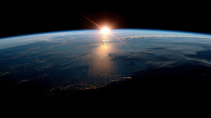 Breathtaking view of earth from space showcasing the curvature of the planet, luminous sunrise illuminating cloud formations and atmosphere, high-altitude perspective