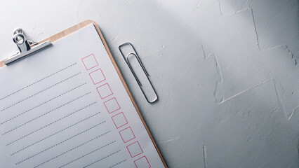 Clipboard with rules checklist and red checkmarks concept. A blank checklist on a clipboard for organization and planning.