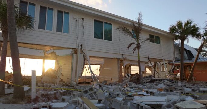 Hurricane Milton storm surge severe damage to waterfront house on Manasota Key, Florida. Destroyed home on gulf coast.