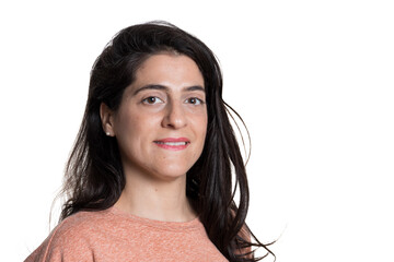 Woman in casual clothes looking at camera on white background.