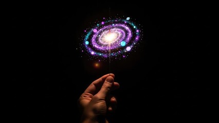 A hand holds a glowing spiral-shaped object with vibrant colors in a dark environment
