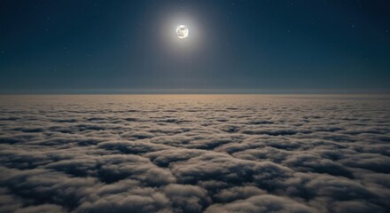 Vast expanse of clouds at night under a bright moon