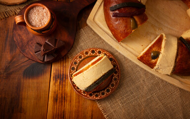 Rosca de Reyes, also called Three Kings Bread, Roscon, Epiphany Cake, traditionally served with hot chocolate in a clay Jarrito. Mexican tradition on January 5th.
