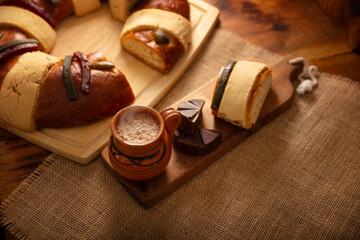 Rosca de Reyes, also called Three Kings Bread, Roscon, Epiphany Cake, traditionally served with hot chocolate in a clay Jarrito. Mexican tradition on January 5th.