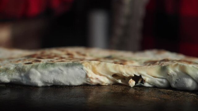 Making crispy flatbread or Gozlemein a busy kitchen