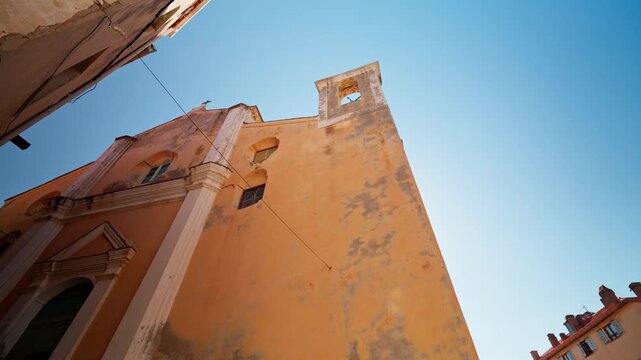 Walking around the narrow streets exploring the old Fortress in Calvi, Corsica, France.