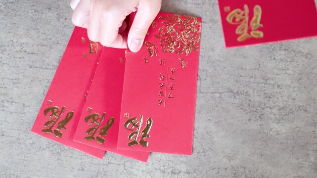 Red Envelope Hong Bao, Red packet, Angpao Envelope with Golden Chinese Symbols for Lunar New Year Celebration. Traditional Lunar New Year greeting, symbol of luck, prosperity, and festive celebration