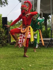 Dancers in traditional costumes performing outdoors