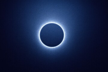 Solar eclipse a dark disk surrounded by a luminous halo in deep blue