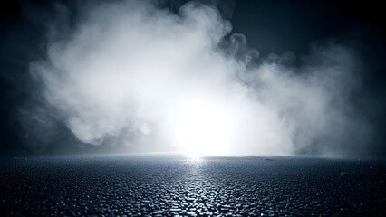 Bright white smoke rising from a dark shiny floor illuminated by a light source creating a dramatic atmosphere.