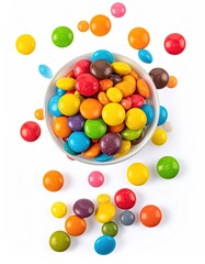 Obraz premium Colorful candy pieces spilling from a white bowl