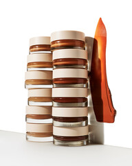 Variety of foundation makeup products in glass jars with white lids