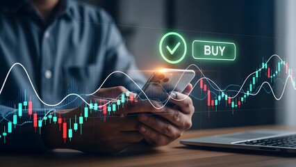 Person holding smartphone with buy button and stock chart overlay