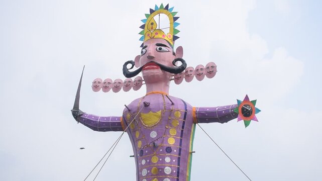 Ravnans being ignited during Dussehra festival at ramleela ground in Delhi, India, Big statue of Ravana to get fire during the Fair of Dussera to celebrate the victory of truth by Lord Rama
