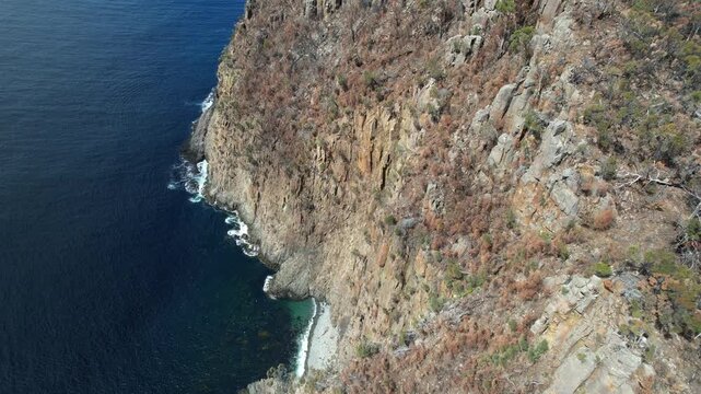 Aerial Shot Of Jurassic Dolerite Cliffs In Tasmania, Australia