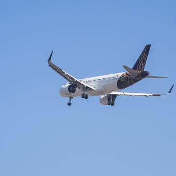 New Delhi, India, November 10 2025 - Vistara Airbus A320 neo take off from Indra Gandhi International Airport Delhi, Vistara domestic aeroplane flying in the blue sky during day time