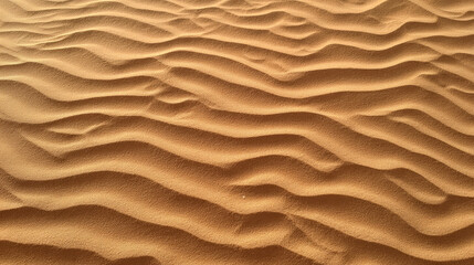 Top-down view of rippled desert sand concept. Textured sand patterns in a desert landscape under sunlight.