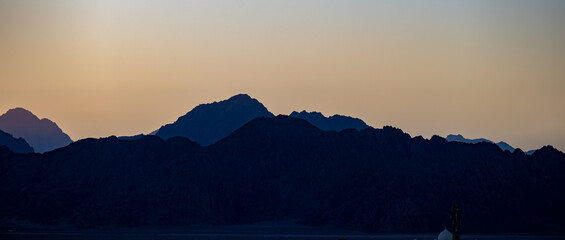 abstract silhouette of mountains at sunset