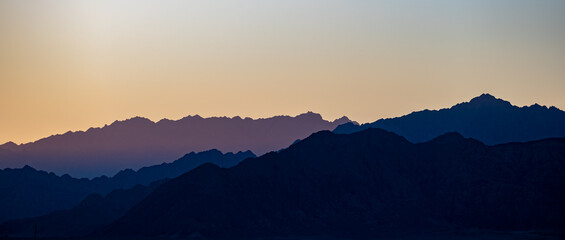 abstract silhouette of mountains at sunset