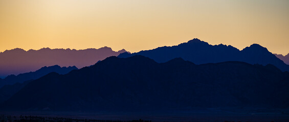 abstract silhouette of mountains at sunset